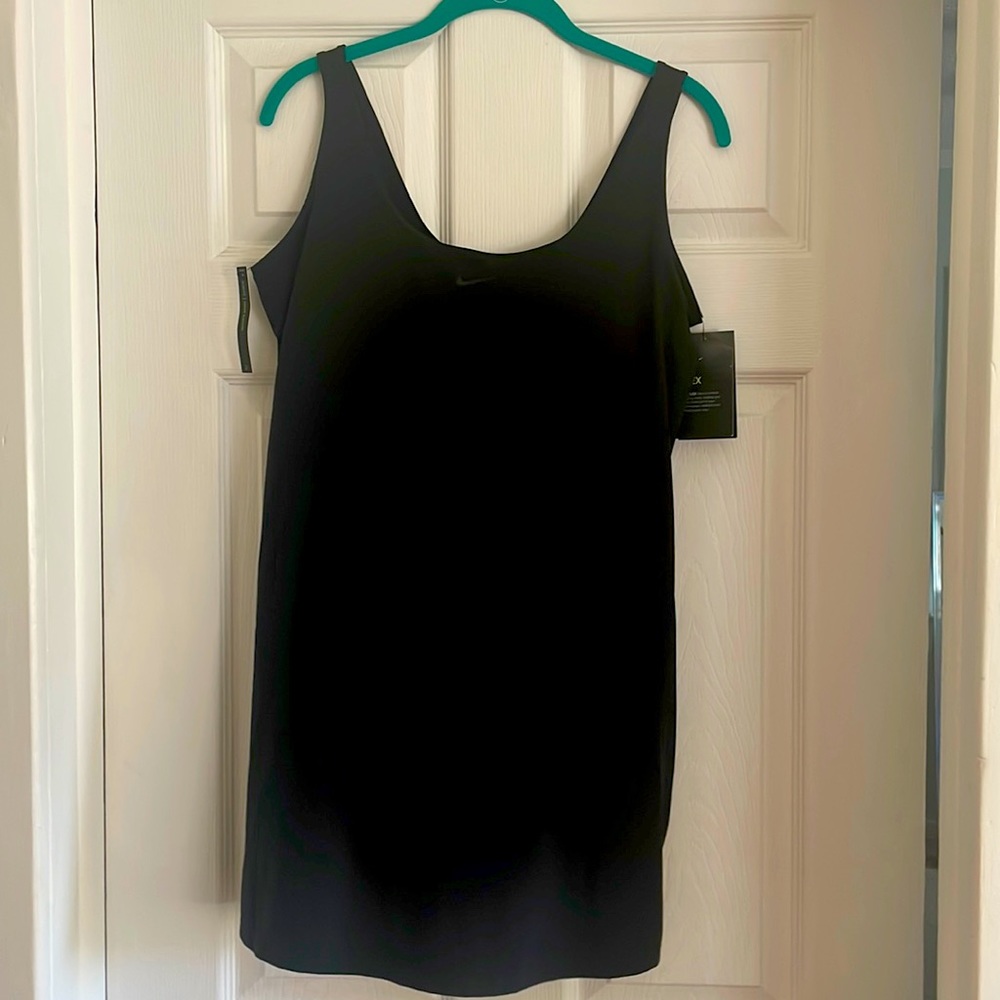 Nike women’s tennis dress with shorts underneath size M